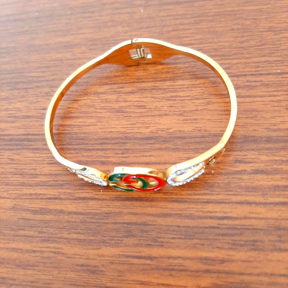 Gold Bracelet with Red and Green Accents